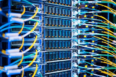 Servers in a data center, colorful wires